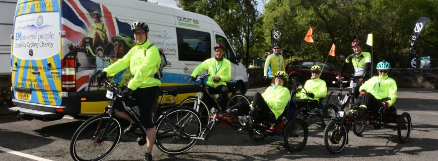 a group of people in flourecent jackets on various types of bikes